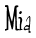 The image is a stylized text or script that reads 'Mia' in a cursive or calligraphic font.