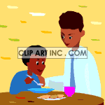 Two african american boys at the dinner table