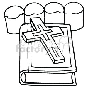 Black and white cross lying on Bible