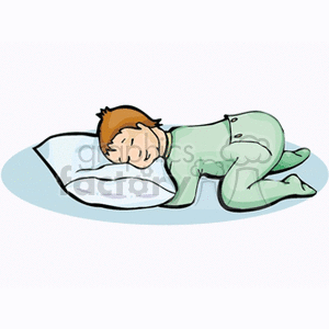 A Young Boy Sleeping on a Pillow in Green Pjs