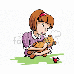 A little girl having tea holding a stuffed teddy bear