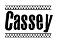 The image contains the text Cassey in a bold, stylized font, with a checkered flag pattern bordering the top and bottom of the text.