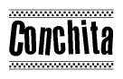The image contains the text Conchita in a bold, stylized font, with a checkered flag pattern bordering the top and bottom of the text.