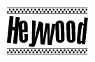 The image contains the text Heywood in a bold, stylized font, with a checkered flag pattern bordering the top and bottom of the text.