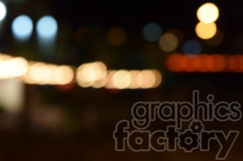 A blurred image featuring bokeh lights, creating a soft and out-of-focus effect with various colors of circular light spots.