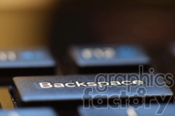A close-up image of a computer keyboard focusing on the black 'Backspace' key with white lettering.