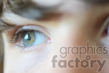 A close-up of a person's eye, showing detailed features including the iris, eyelashes, and surrounding skin.