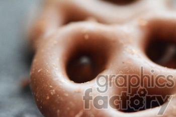 Close-up image of a chocolate-covered pretzel.