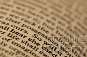 Close-up image of a blurred text from an open book with focused words 'hear' and 'life'.