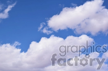 An image of a clear blue sky with scattered white clouds.