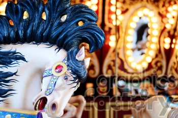 A close-up of a decorative carousel horse with black mane, colorful harness, and ornate, illuminated background from a carousel ride.