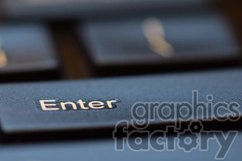 Close-up image of an Enter key on a keyboard.