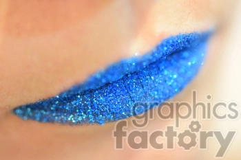 Close-up image of lips wearing blue glitter lipstick.