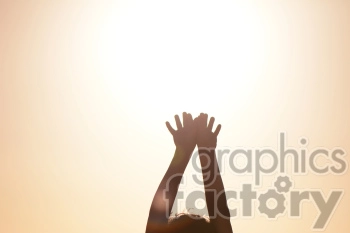 arms raised into the sun